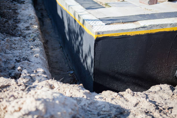Professional Exterior Waterproofing technician working in Long Beach, MD